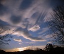 A dramatic scene is performed upon a meteorological proscenium