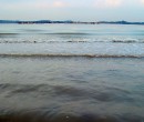 Tiny waves roll in at Pasir Ris