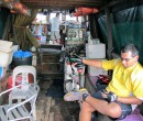 Kenneth and his collapsible bike on the bum-boat