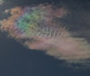 Cirrus clouds that are iridescent or nacreous