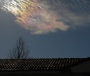 Cirrus clouds that are iridescent or nacreous