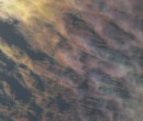 Cirrus clouds that are iridescent or nacreous