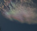 Cirrus clouds that are iridescent or nacreous